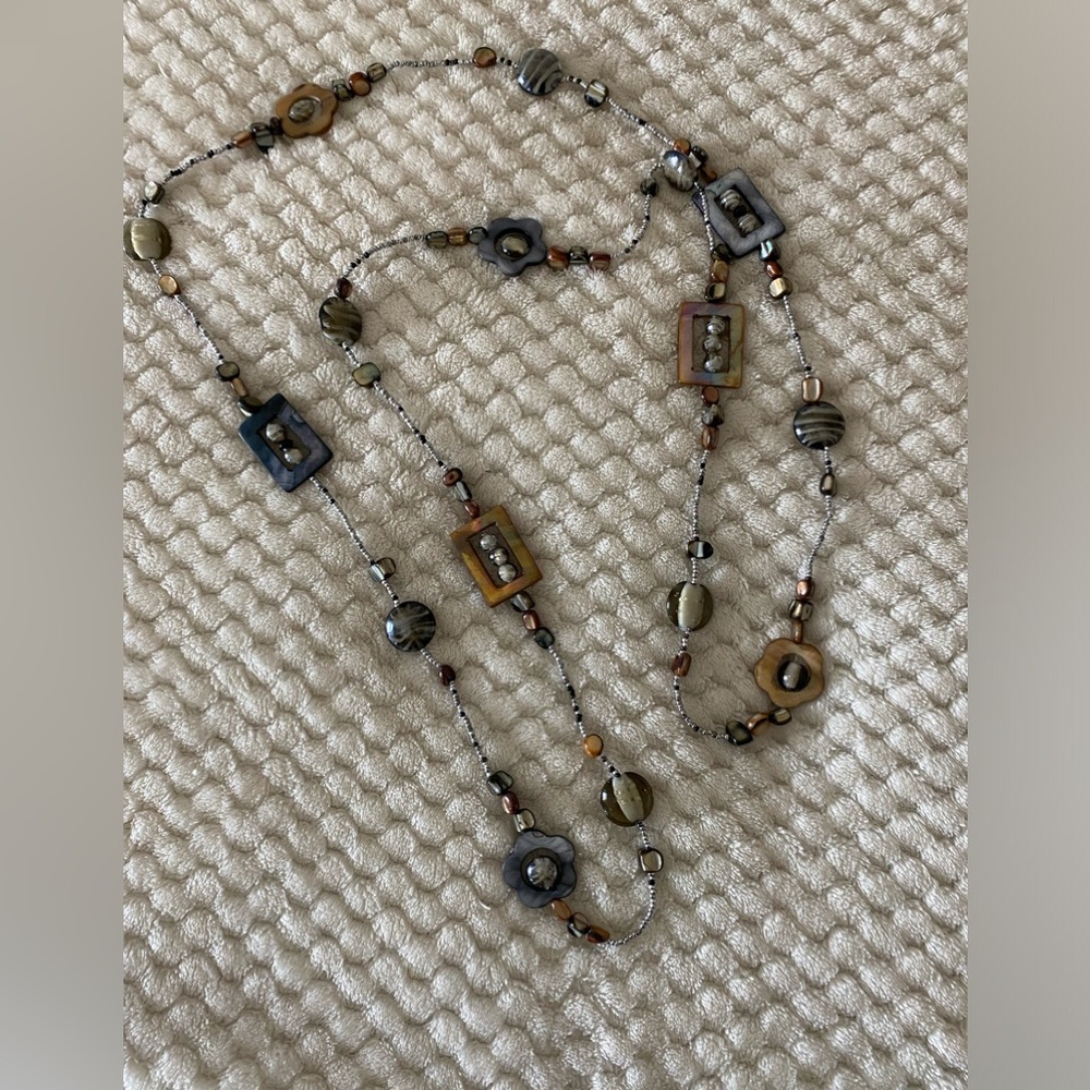 Multi bead long strand necklace